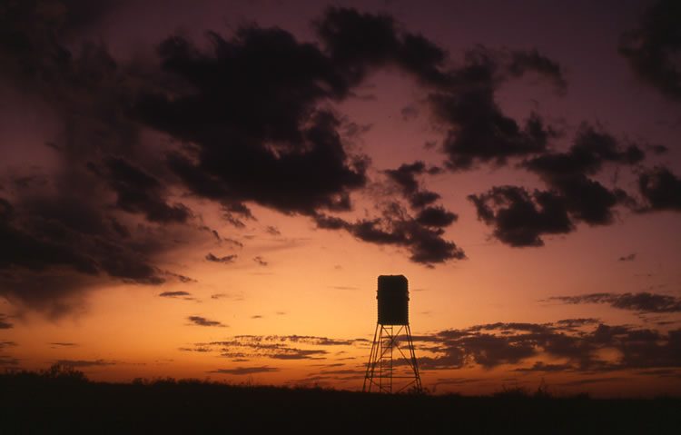 Hunting blind silhouetted at sunset on Hale Ranch
